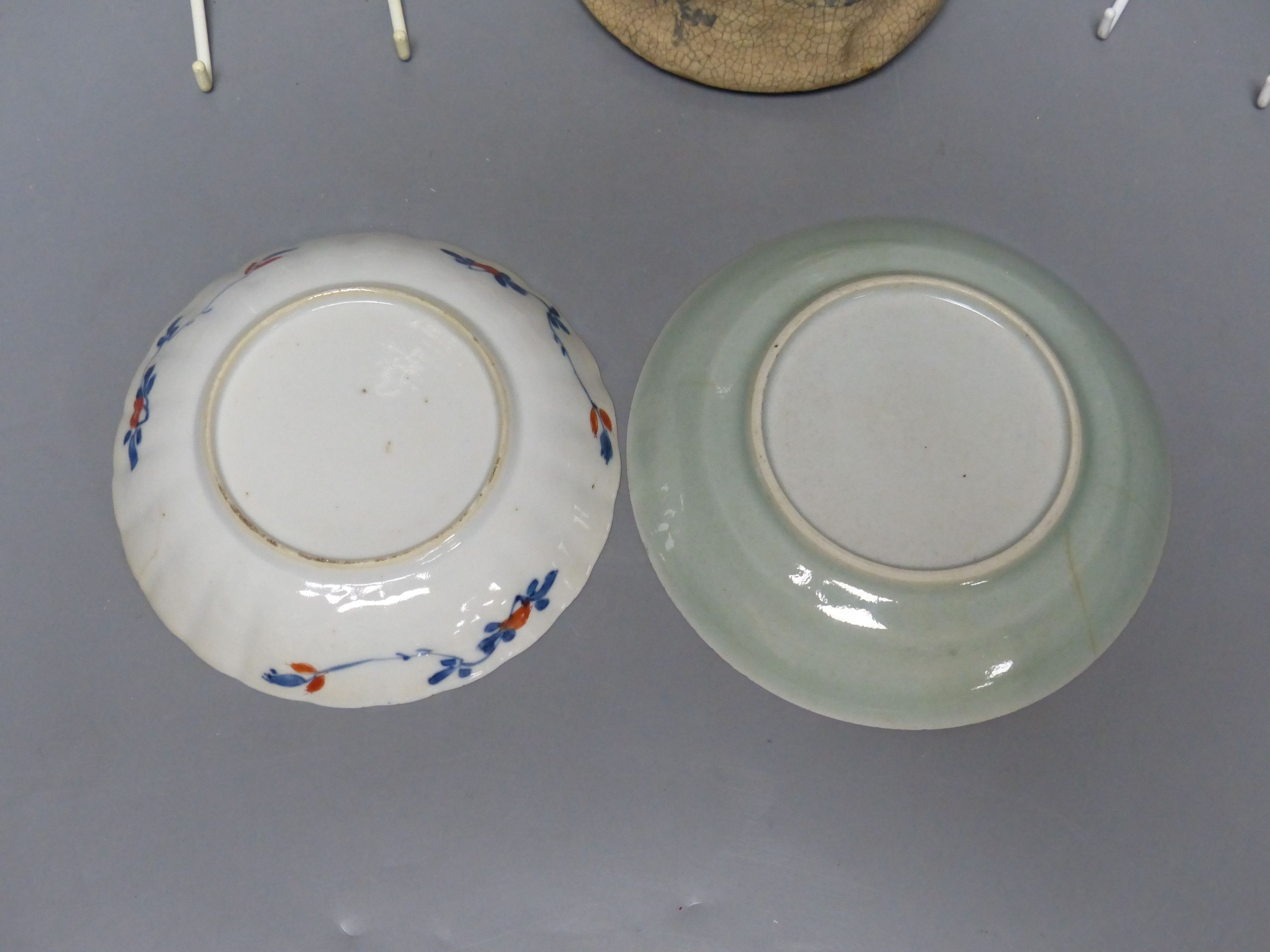 Chinese Imari pattern dishes, two others, a teapot, height 15cm, and a pottery bowl